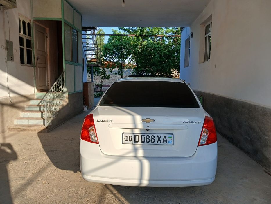 Lacetti 1.6 avtomat  2013