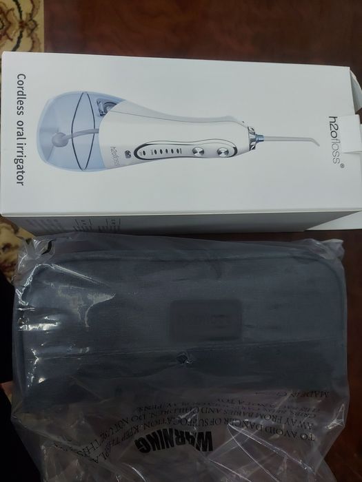 Ирригатор для зубов новый