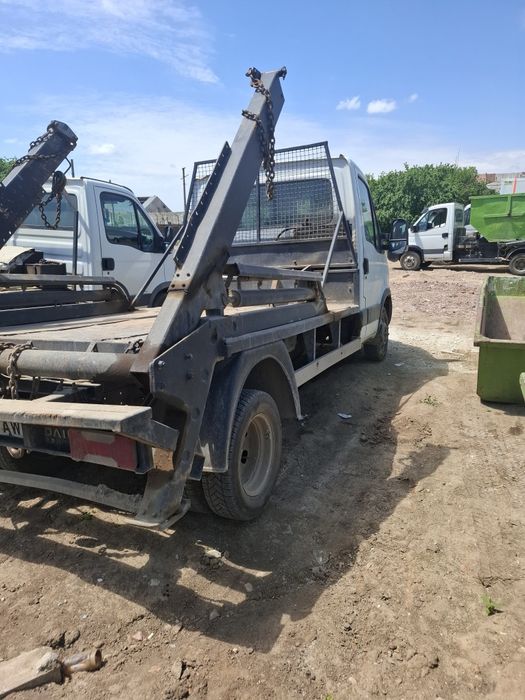 Vând Iveco Containiera Abrollkipper + 7 containere