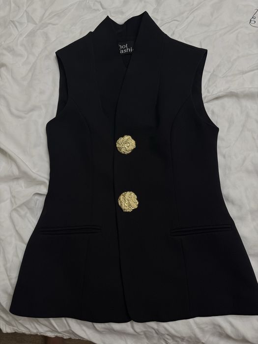 Продам новый костюм