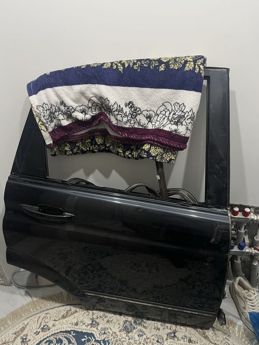 Ssangyong Kyron автомобиля,правая зандняя дверь.Не битая,не крашеная.