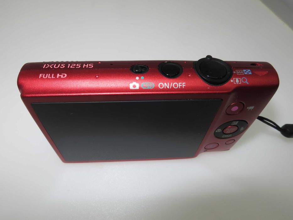 Canon IXUS 125 компактен цифров фотоапара в оранжево червен цвят уникат и отлично състояние като НОВ, работи перфектно