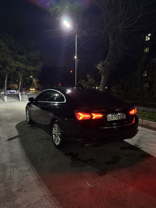 Malibu 2  rangi qora holati ideal 19-20 yili