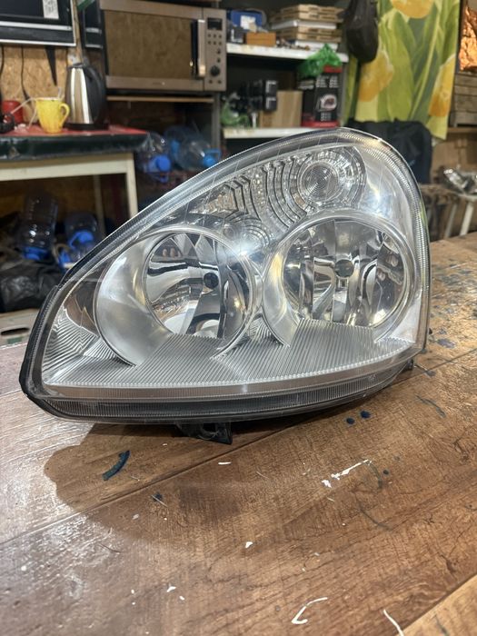 Фара приора 1 левая оригинал бош