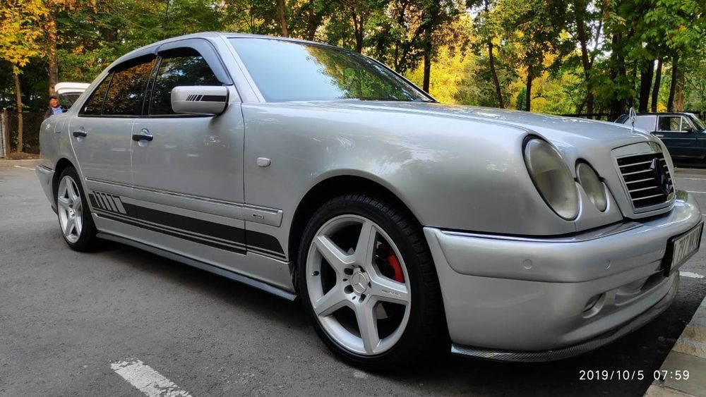 Бампер передний Mercedes 210 E 55 AMG