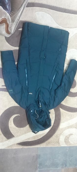 Пуховик удленённый,новый.