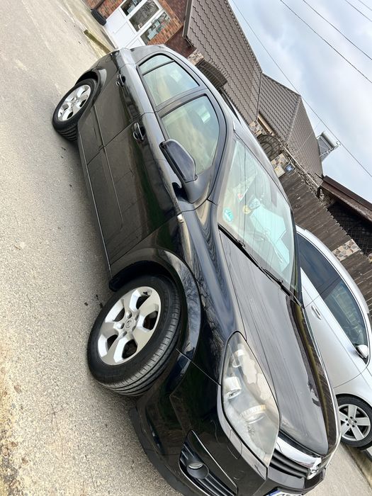 Opel astra H se vinde arata ca in poze specific anului