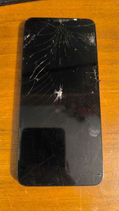 Телефони за части