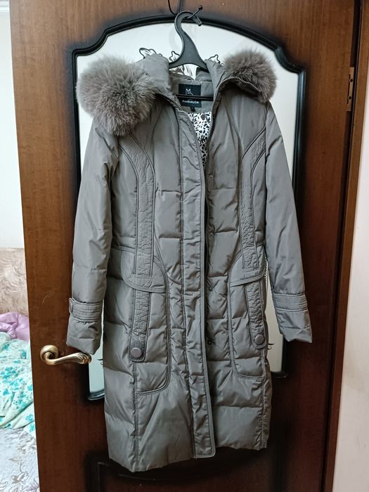 Продам пуховик серого цвета