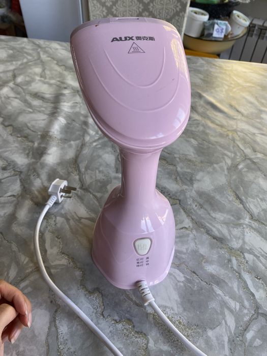 Паровой утюг рабочий