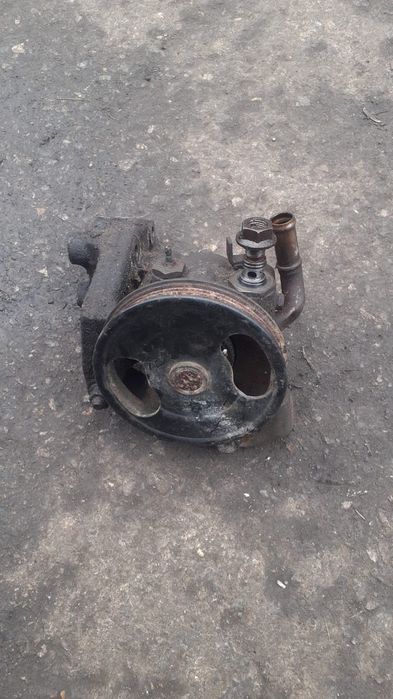 Гур насос  мазда 323