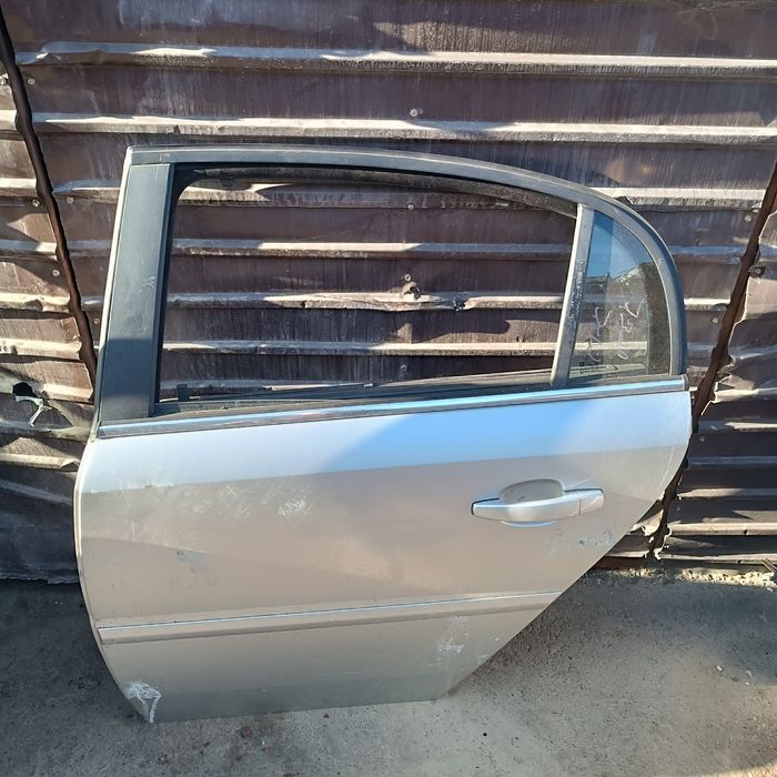 Двери на Opel Vectra C