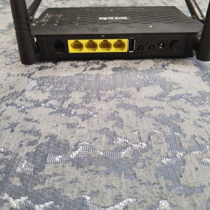 Продам дёшево модем Tenda.