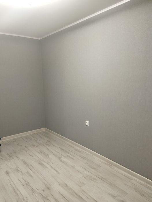 Поклейка  обоев.