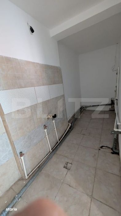Casa cu 2 camere si mansarda ,plus bucatarie de vara .