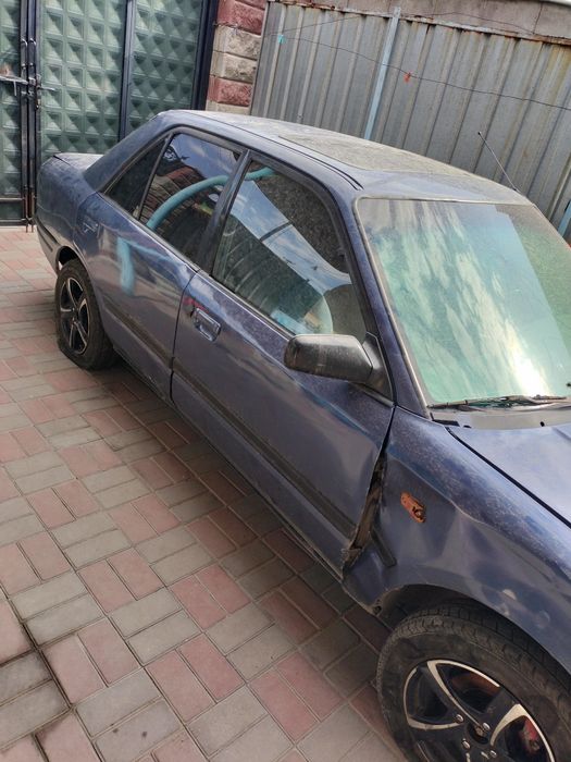 Продам на запчасти Мазда 323