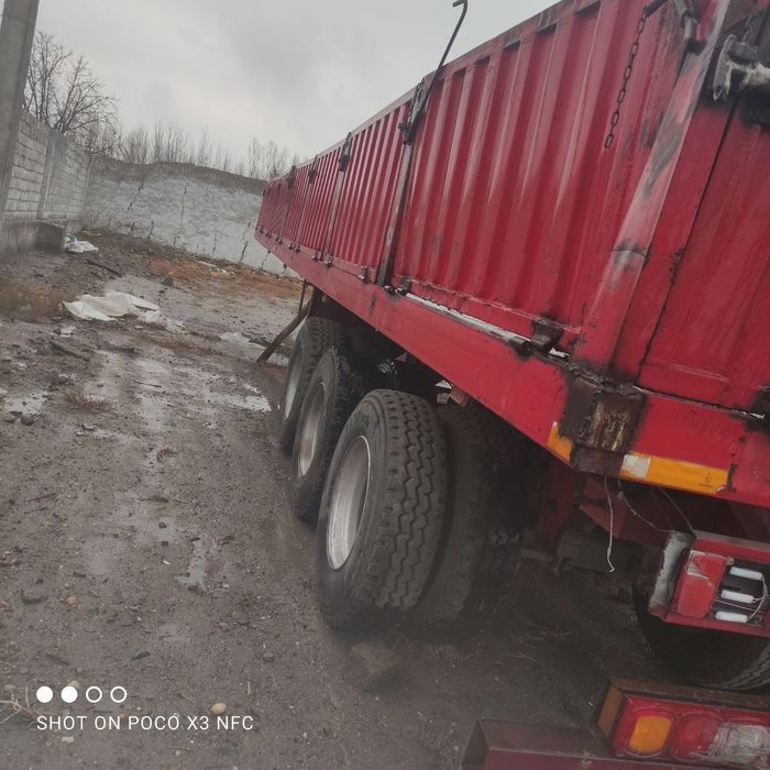 60 контейнеровоз прицеп сотилади