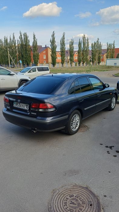 Мазда 626 птичка