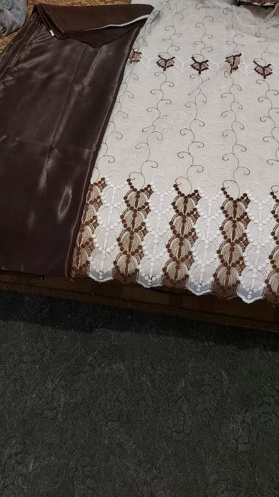 Шторы новые изплотного атласа