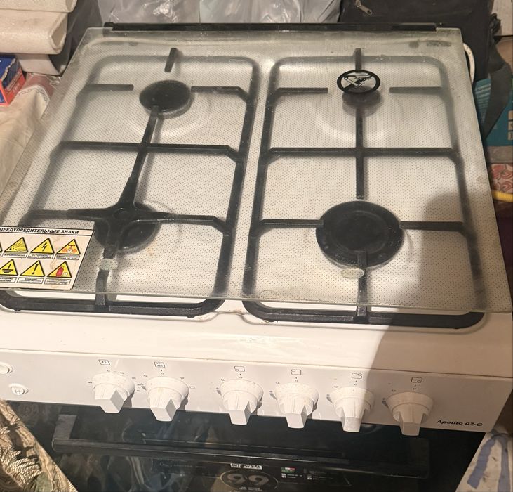 Газовый плита с духовкой