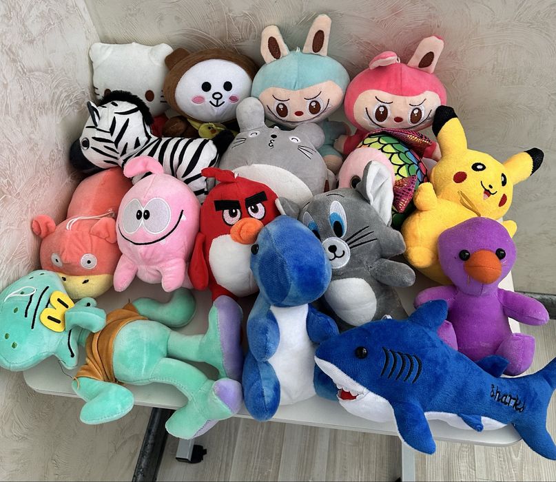 Игрушки мягкие хватайка