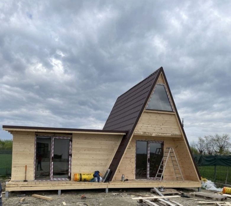 Executăm cabane din lemn