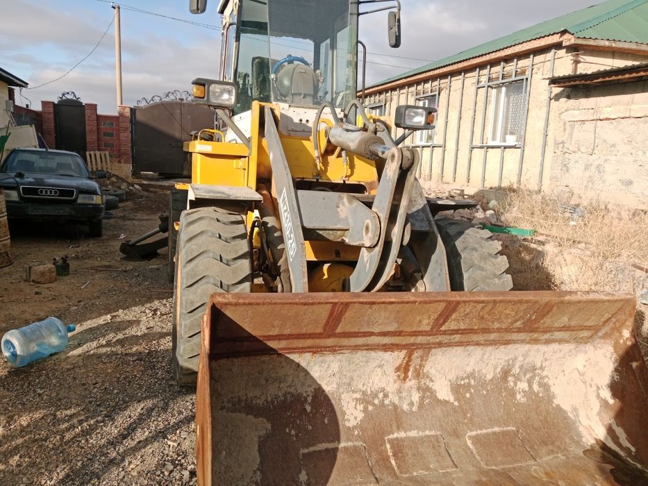 Продам экскаватор погрузчик