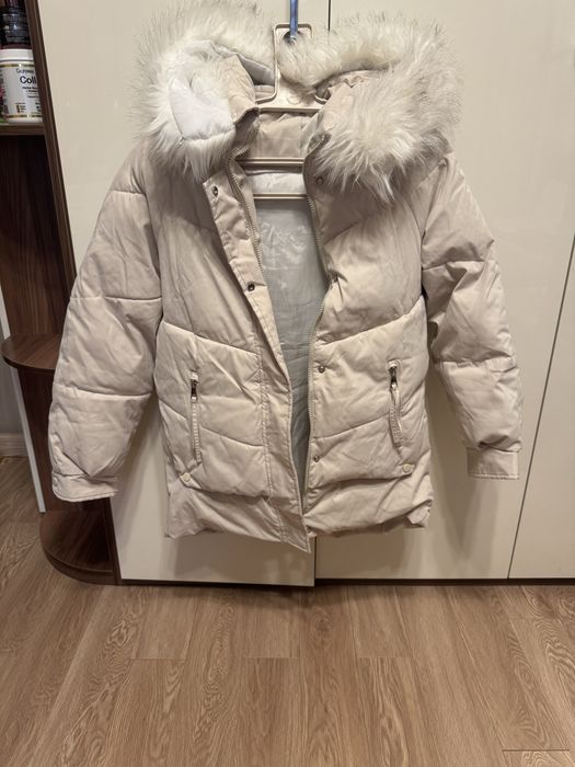 Пуховик женский в отличном состоянии