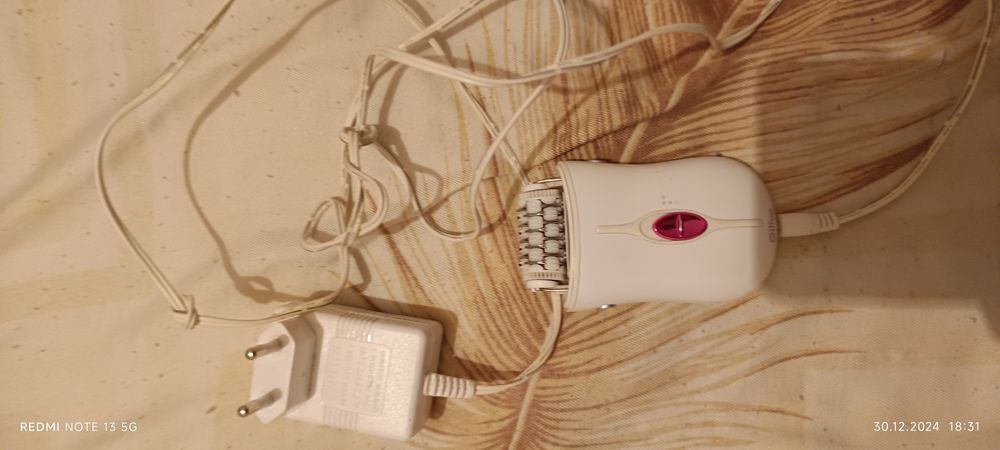 Epilator Philips și Qlive negru și alb