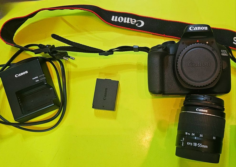 Фотокамера Canon EOS 4000
.
. - я .