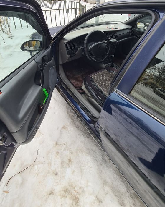 опель вектра б. 1,8 Автомат