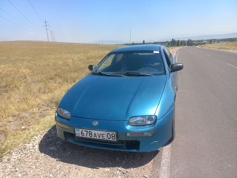 Мазда323F 95г бензин