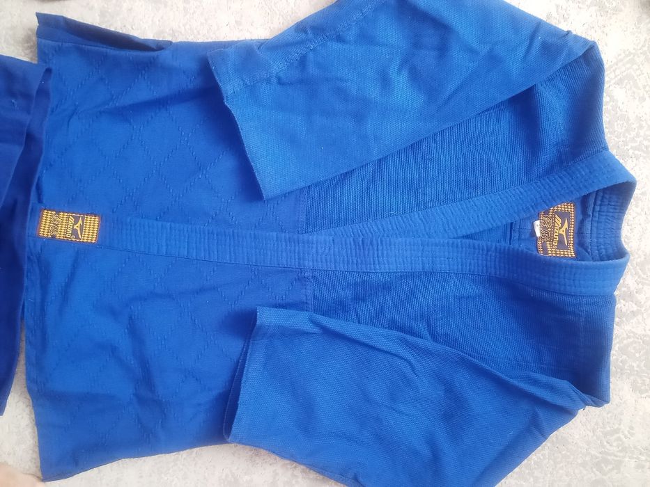 Продам кимано синего цвета