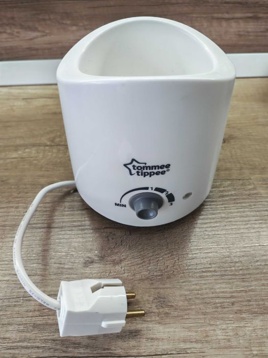 Продавам в добро състояние Ел. нагревател за шишета и бурканчето