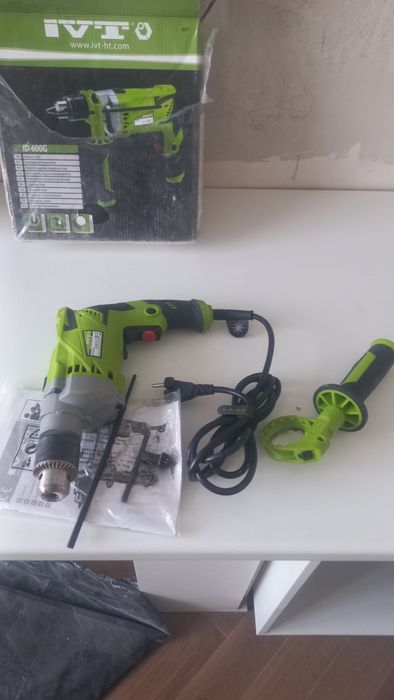 Ударная дрель новая