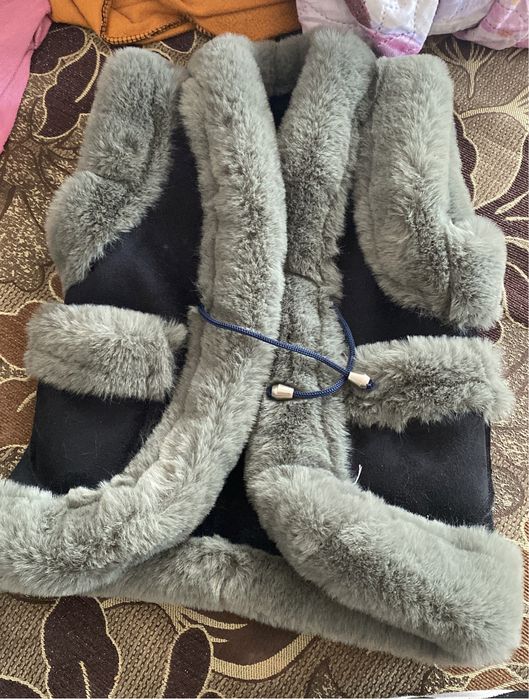 Жилетка новая