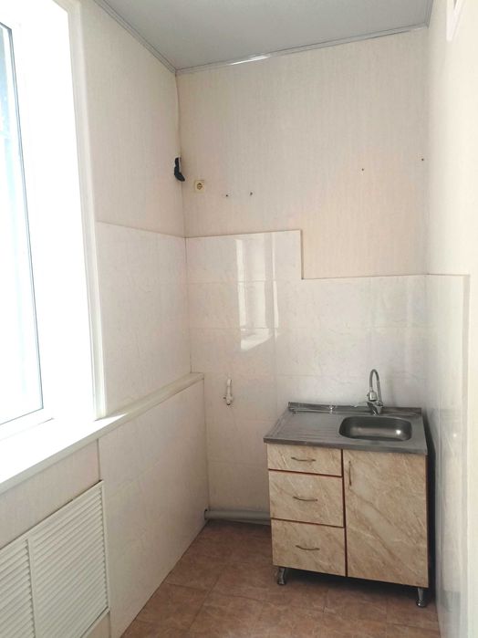 Двухкомнатная квартира 49,8 м.кв на первом этаже .