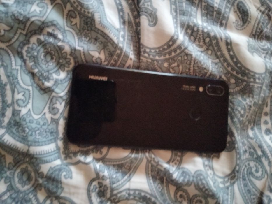 Huawei p20 lite și Nokia 3100 Made în Germany