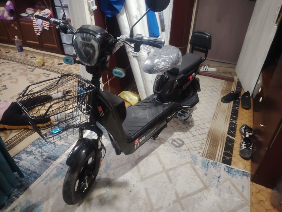 Электроскутер продам новый.