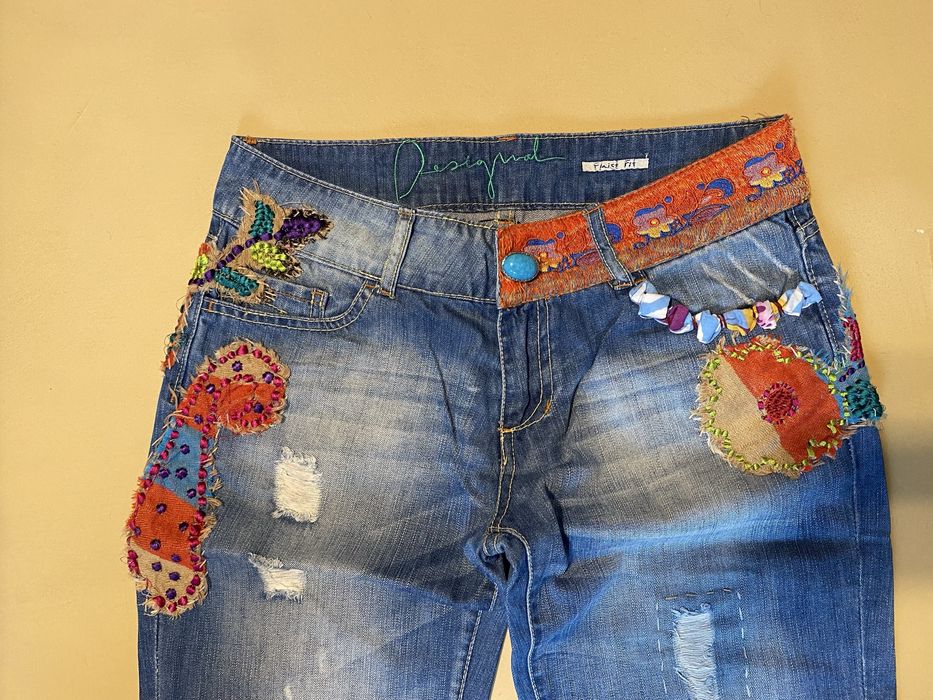 Blugi evazati “Desigual” -dama-