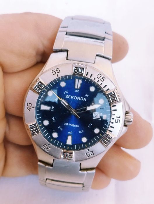 Ceas barbatesc Sekonda, miscare cuart, din otel inoxidabil.