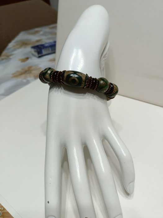 Браслеты с натуральным камнем дзи