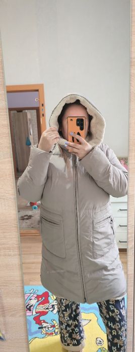 Продам зимний пуховик 52- 54 размера