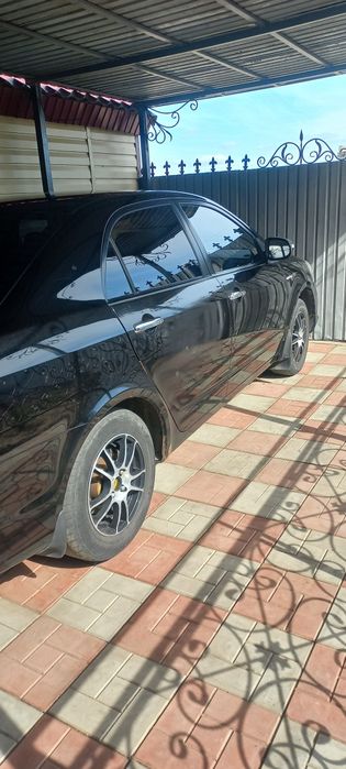 Продам джили ск7 2013г газ-бензин