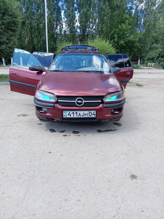 Опель омега объём 2,