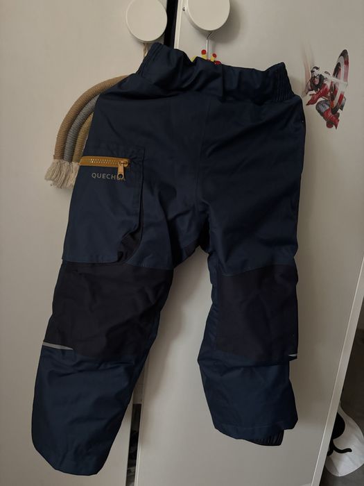 Детски непромокаем панталон Quechua и син гащеризон Lupilu