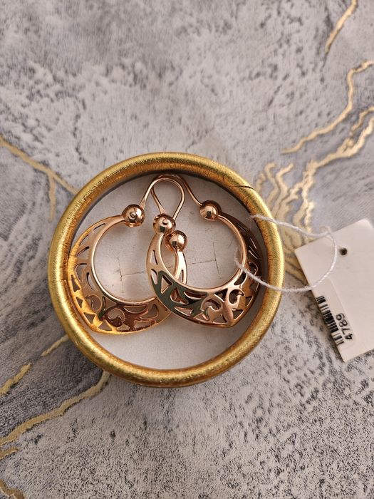 Продам золотые серьги