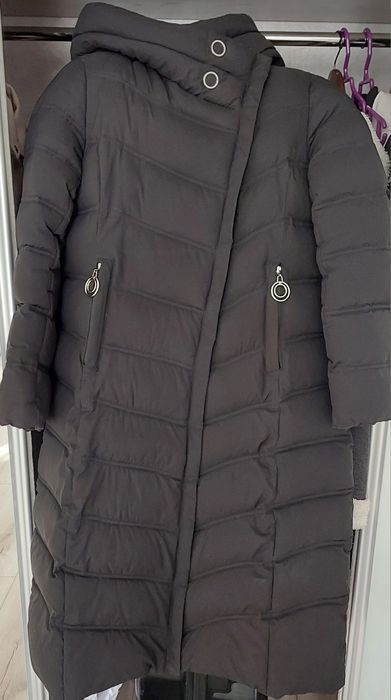 Продам женский пуховик.