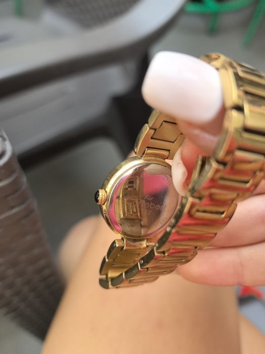 Позлатен часовник cortebert