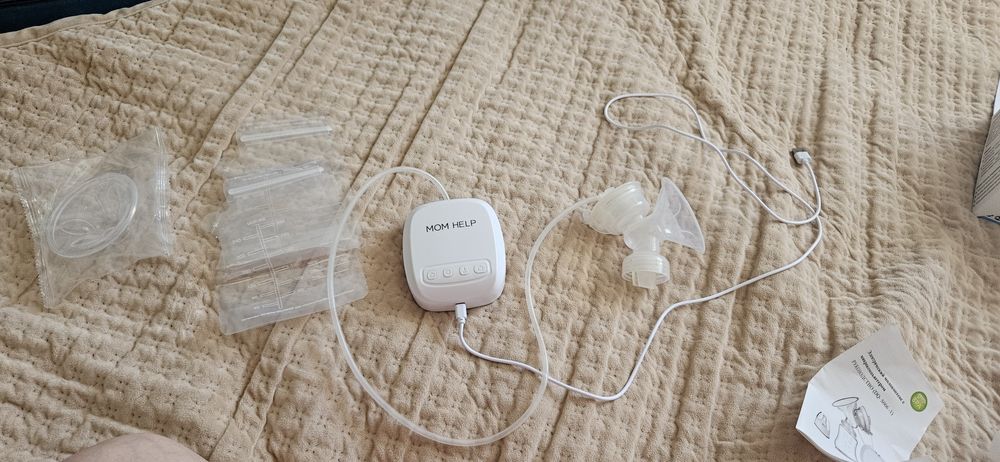 Продам электрический молокоотсос